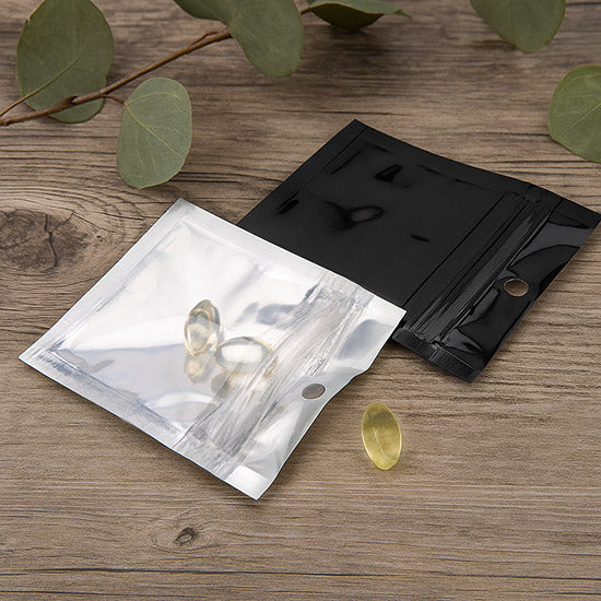 Sac zip métallisé transparent/dos noir et troue de suspension 5x5cm (100 pièces) [HZBB9CB]
